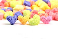 0.60 cu ft FunPak Mini Plant Based Biodegradable Packing Peanuts<br><font color=blue>Rainbow Hearts</font>