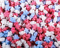 0.60 cu ft FunPak Mini Plant Based Biodegradable Packing Peanuts<br><font color=blue>Red, White, Blue Stars</font>